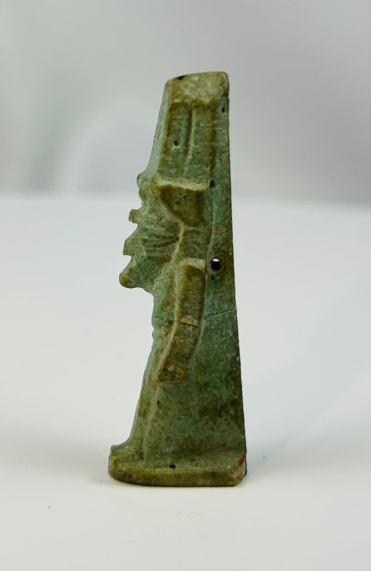 Small Egyptian faience figure of the god Nefertem associated with rebirth and the lotus.