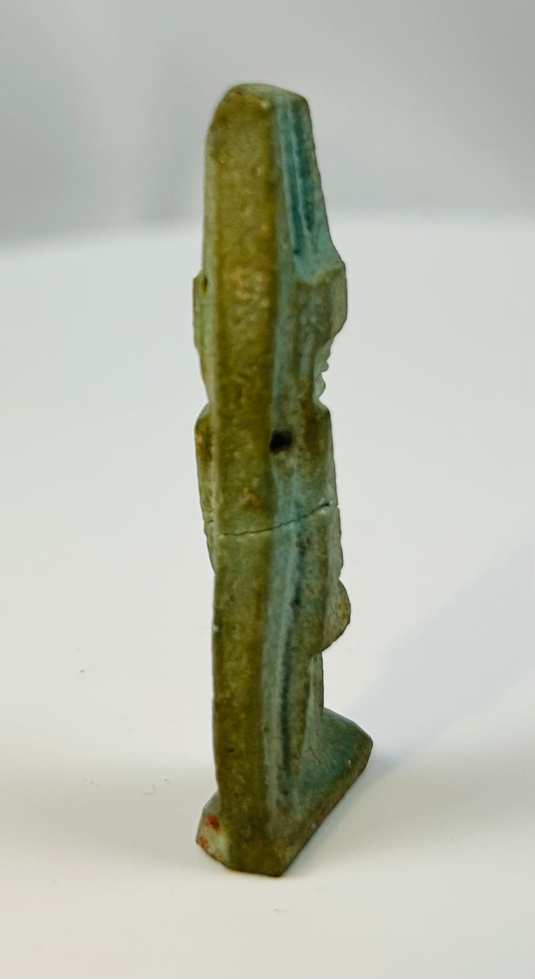 Ancient Egyptian glazed faience amulet depicting Nefertem with rear support pillar.