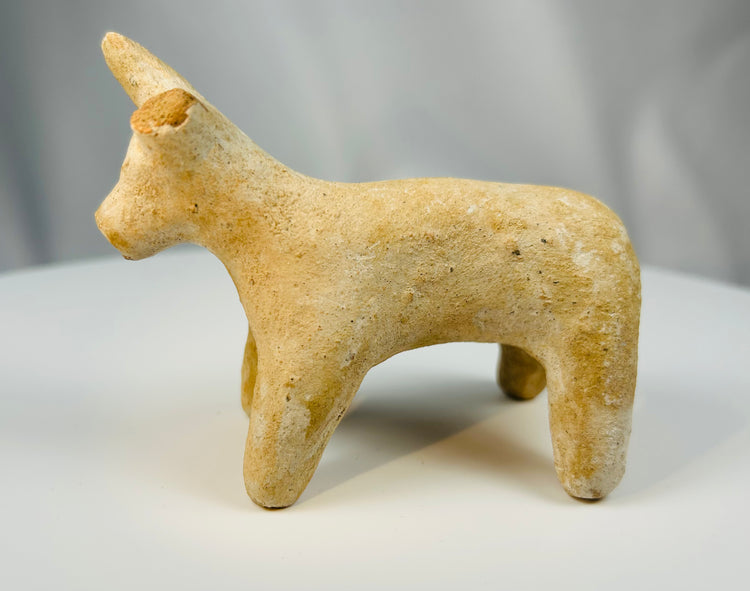 Ancient Iranian terracotta bull figurine from the Amlash region near the Caspian Sea.