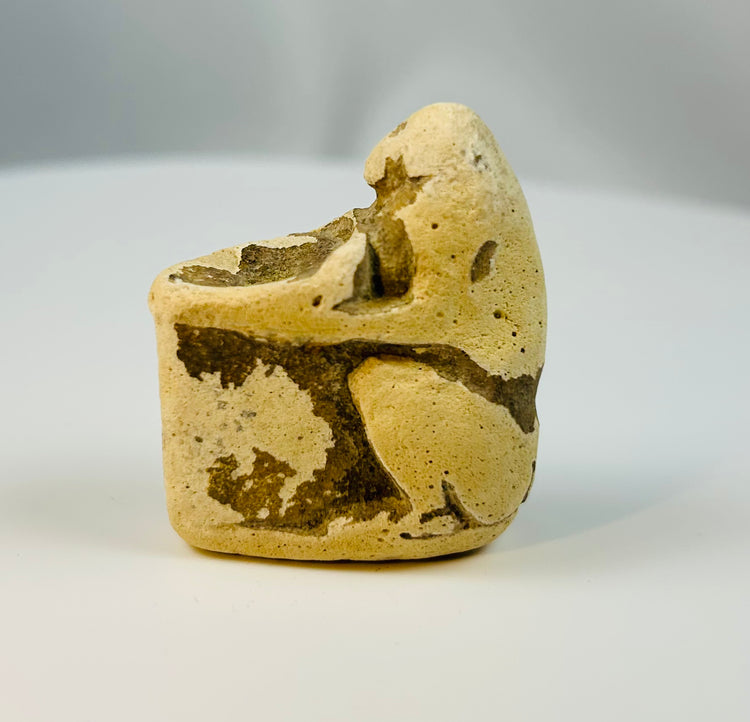 Late Period Egyptian limestone baboon votive sculpture with hollowed offering basin