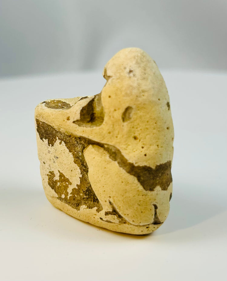 Ancient Egyptian temple offering vessel in the form of a seated baboon, carved limestone figure