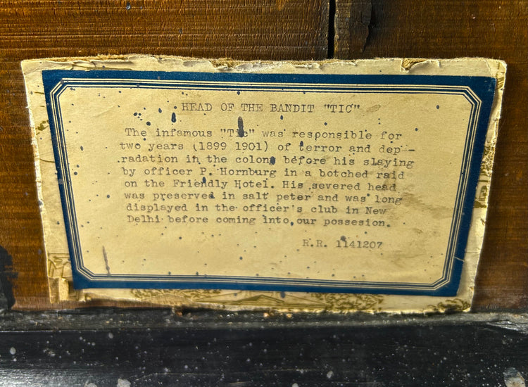 Rare 19th-century mummified head ‘TIC’, clay construction with real human teeth, mounted on brass stand