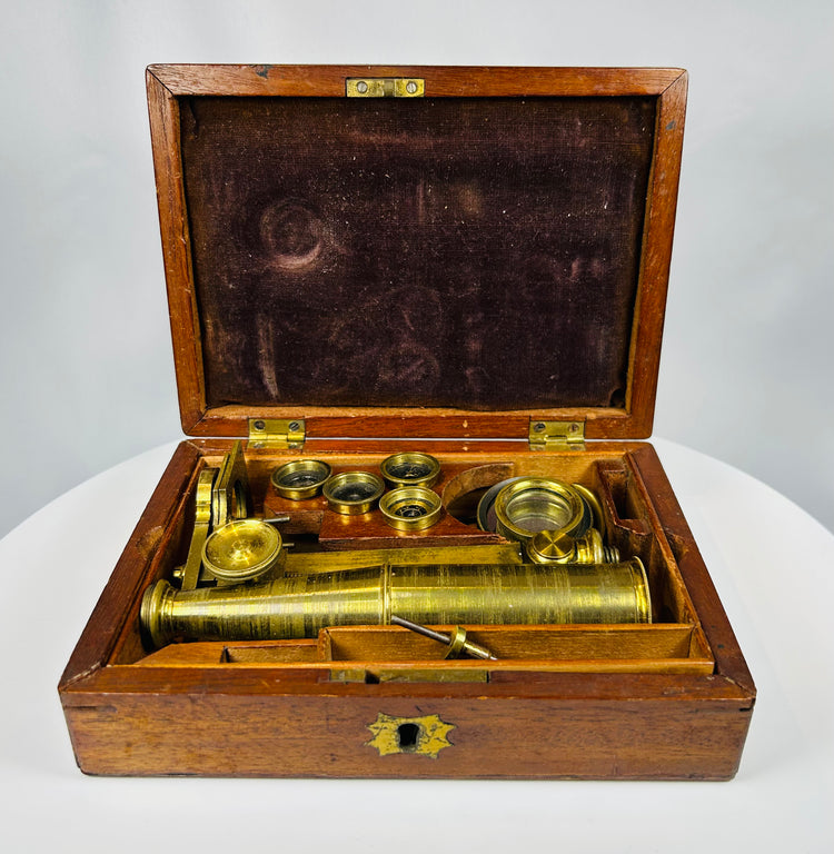 historic brass microscope with rack and pinion focusing mechanism