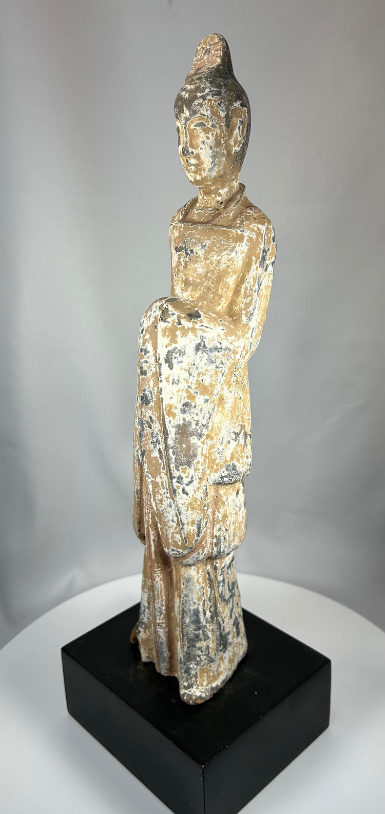 Chinese Northern Wei earthenware court figure with traces of pigment