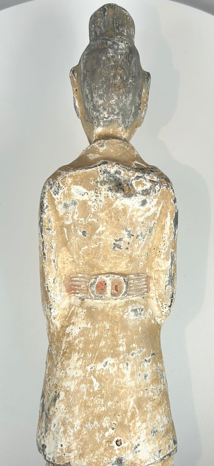 Northern Wei dynasty funerary sculpture with stylized robes and serene expression