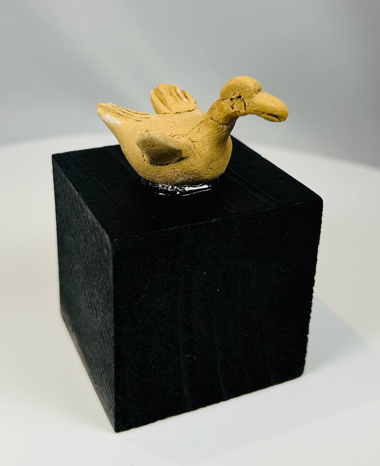 Hand-modeled Pre-Columbian clay bird effigy representing animal symbolism in West Mexican culture