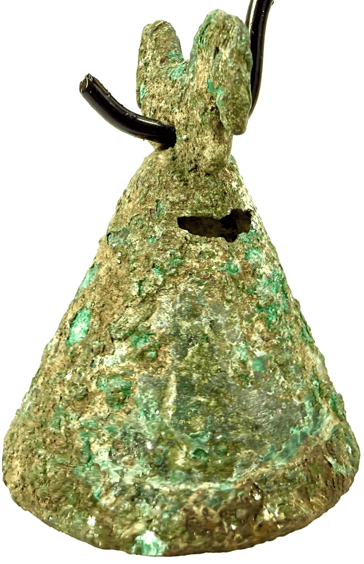 Ancient Persian bronze horse-head bell featuring zoomorphic decoration, a moulded rim band, and green archaeological patina with mineral deposits.