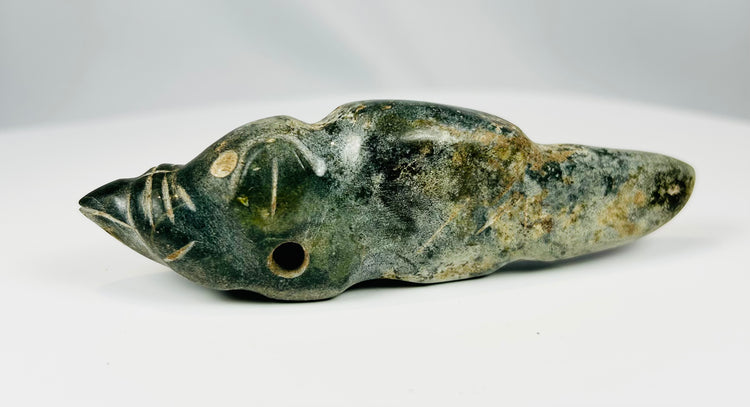 Ancient Pre-Columbian pendant carved from greenstone with symbolic animal form