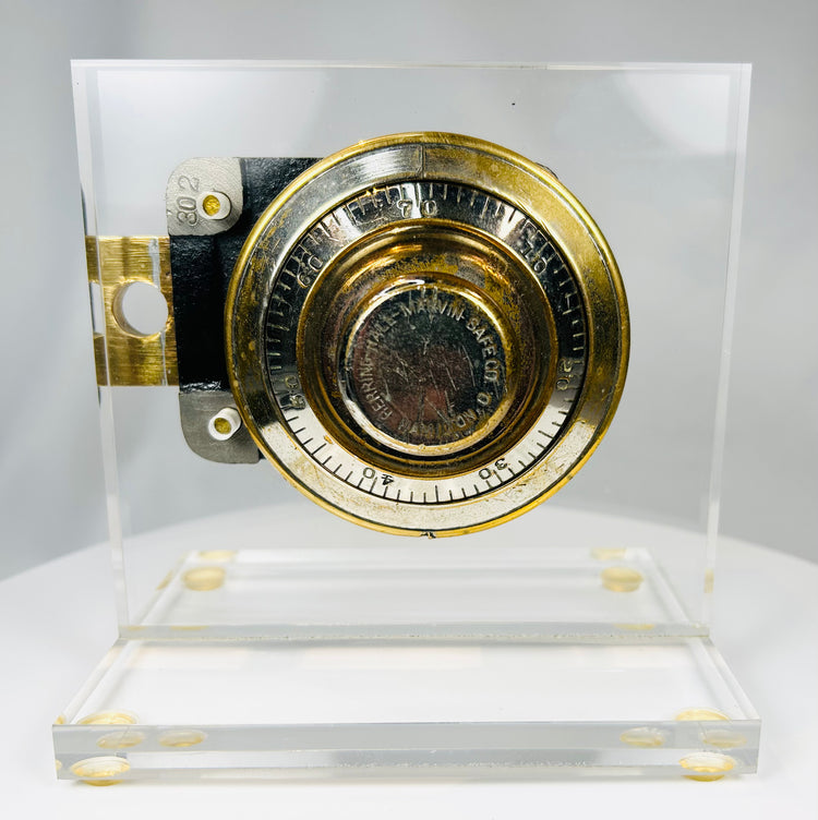 Antique Herring Hall Marvin safe lock mechanism with brass dial and acrylic display
