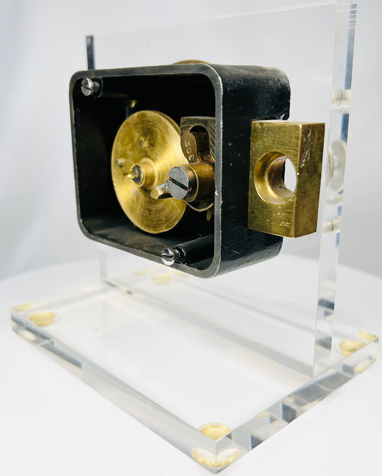 Early industrial safe lock mechanism with rotating dial and internal assembly