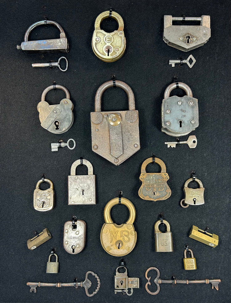 Framed collection of antique locks and keys in shadow box with industrial design