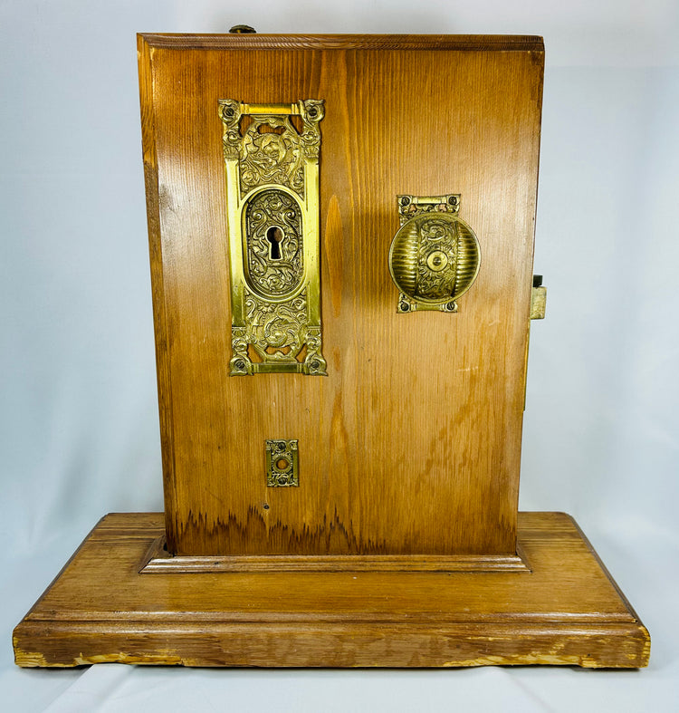 Reading Hardware lockset display with ornate knob and visible internal mechanism