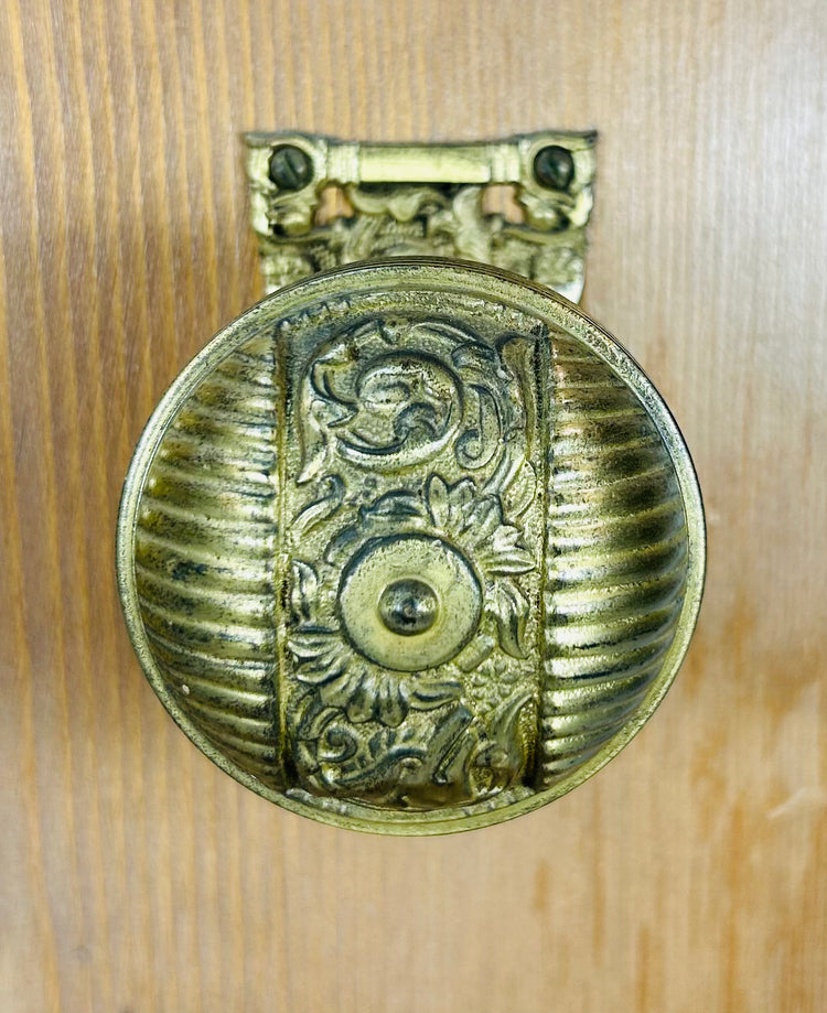 Vintage lock and hinge display with decorative Victorian style brass hardware