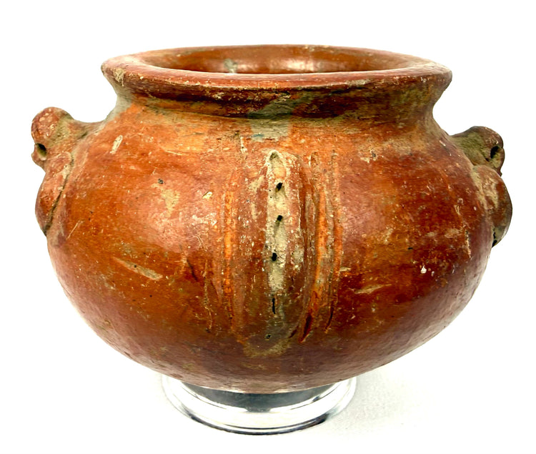 Antique terracotta vessel attributed to the Late Pre-Columbian period, featuring an irregular flared opening, textured clay surfaces, and mineral deposits.