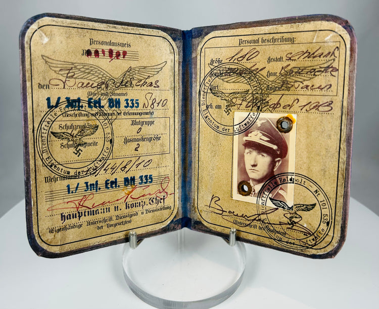 WWII era German Soldbuch with blue cloth cover and eagle insignia