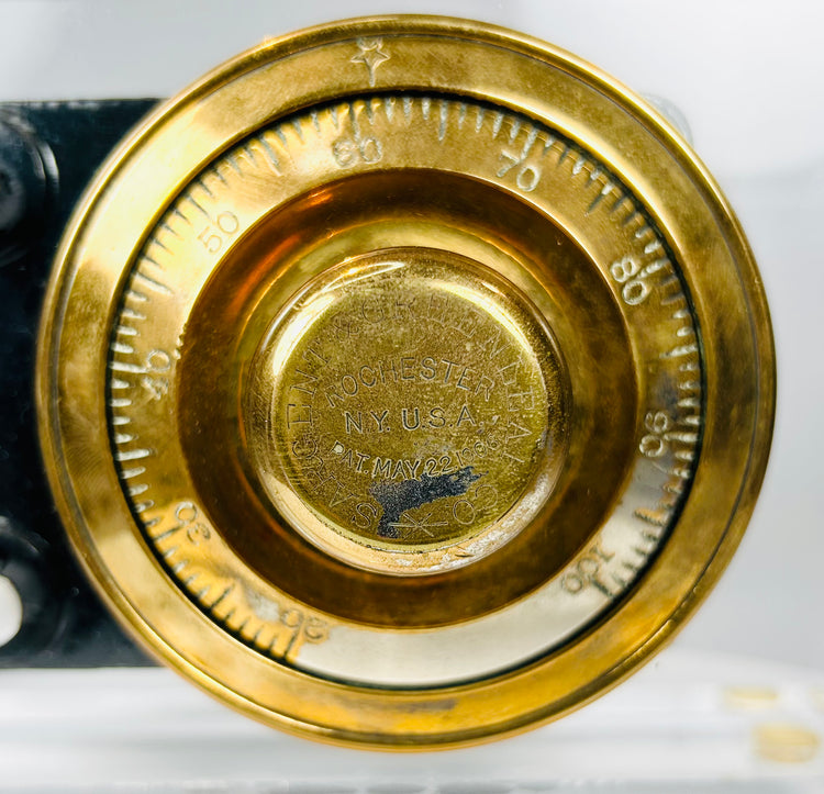 Antique safe lock mechanism front with original brass dial and patent marking