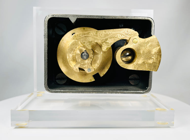 Early 1900s vault lock mechanism front view with aged patina and wear