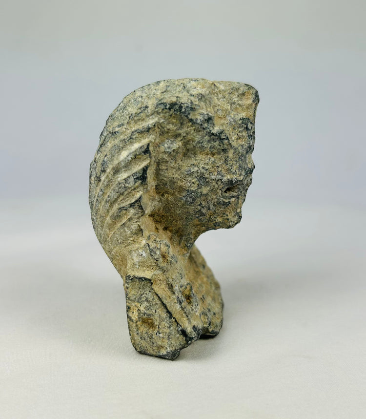 Historic Grand Tour limestone carving of a pharaoh’s head with nemes headdress and uraeus emblem, dated around 1800–1920, photographed on a neutral surface.