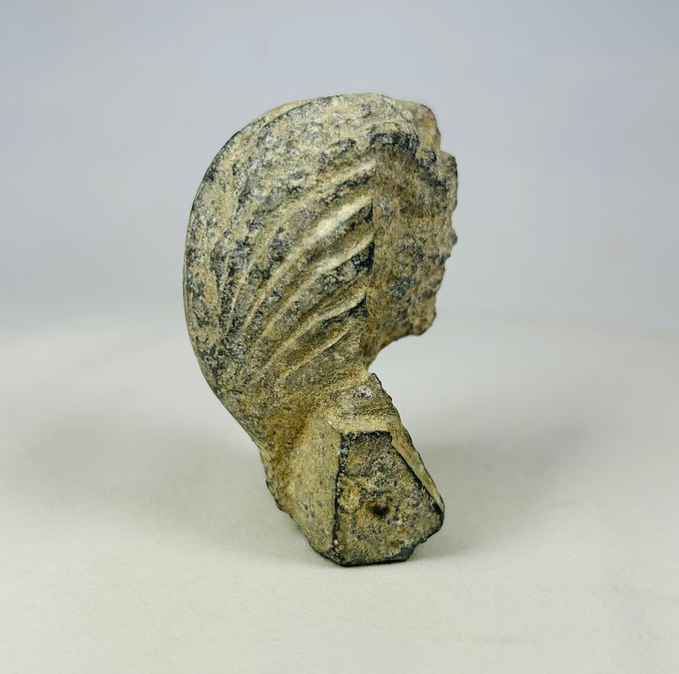 Authentic limestone pharaoh head carving with nemes headdress and uraeus, created for European Grand Tour collectors around 1800–1920, displayed on a simple neutral background.