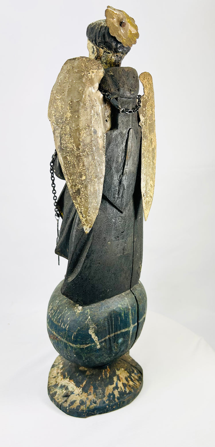 Colonial Latin American folk-religious polychrome wooden angel, 18th–19th century, orb base