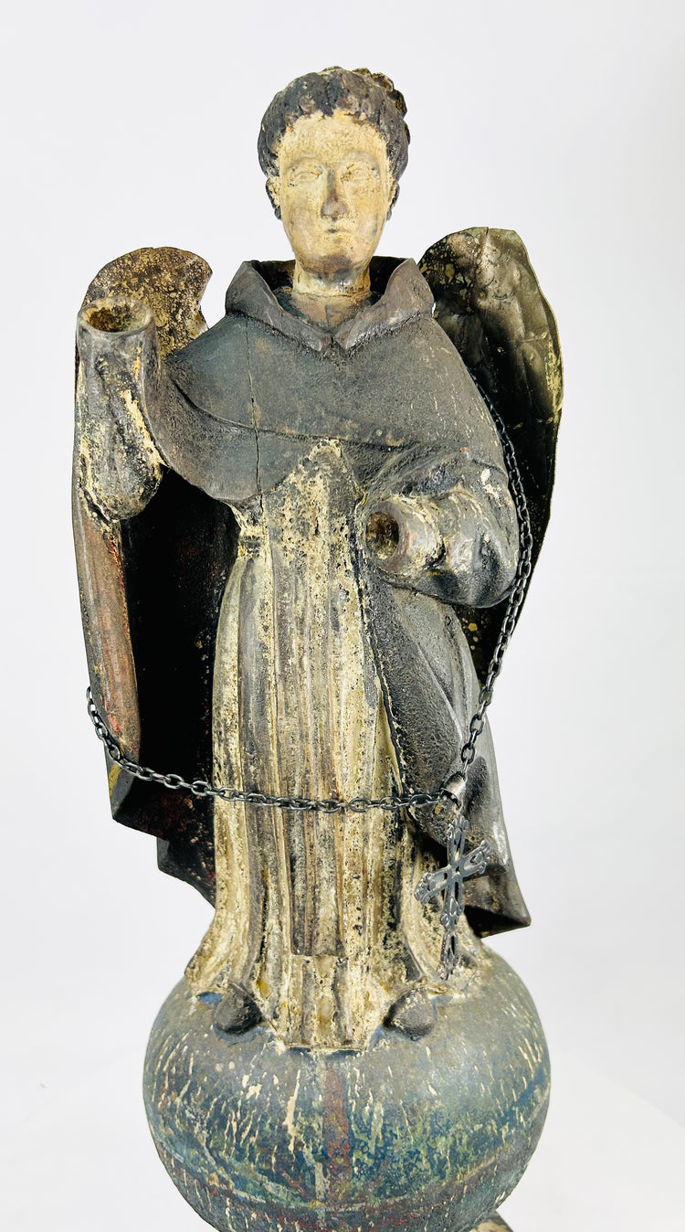 Antique Colonial Latin American polychrome wooden angel with gilded wings and orb base