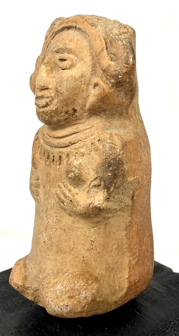 Pre-Columbian Veracruz female terracotta sculpture with almond-shaped eyes, incised mouth, and ornamental necklace.