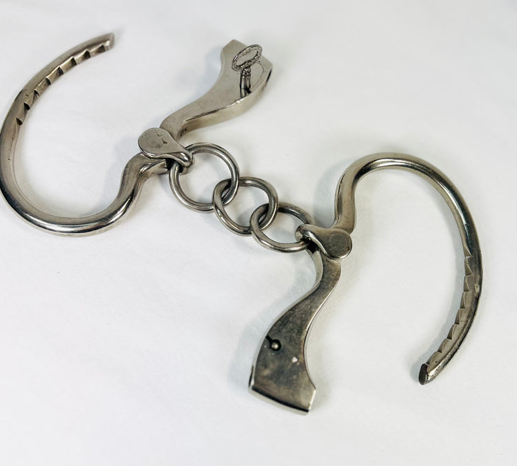 John J. Tower Adjustable Handcuffs with Key | United States | 1866–1940s