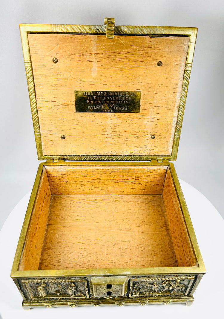 Decorative bronze box with courtly scenes and ornate Renaissance motifs