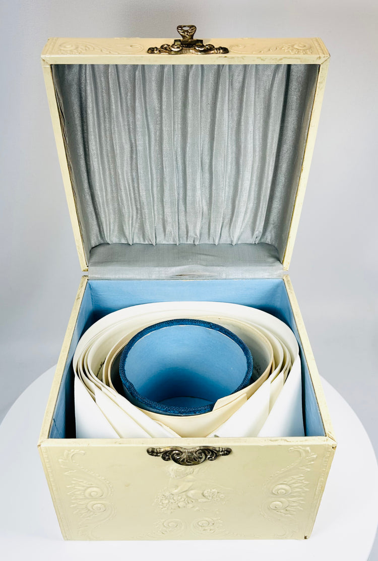 Edwardian era collar box with floral relief and classic menswear accessories