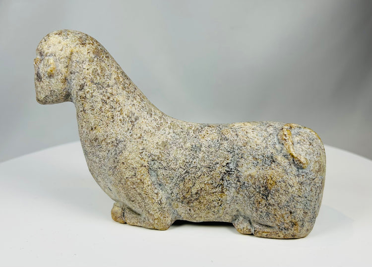 Abstract stone sculpture from West Africa with weathered surface and patina