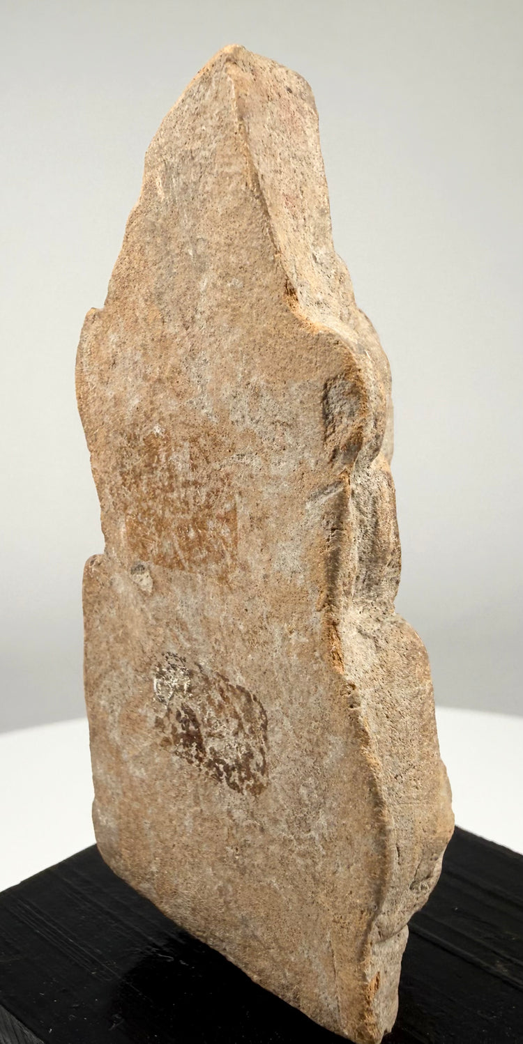Ancient Indian terracotta votive figure measuring approximately 5 inches tall, mounted on a modern black base for presentation.