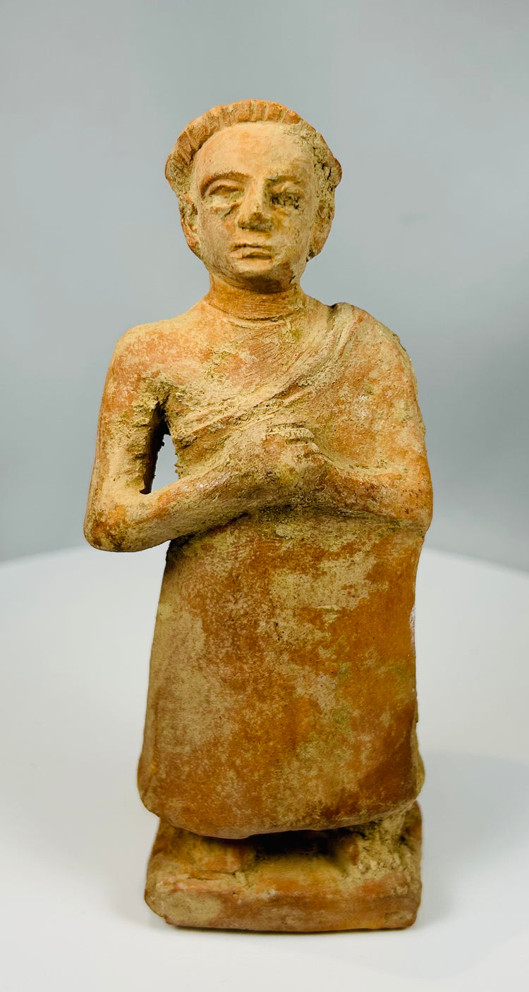 Hand-modeled terracotta figure in folk art style