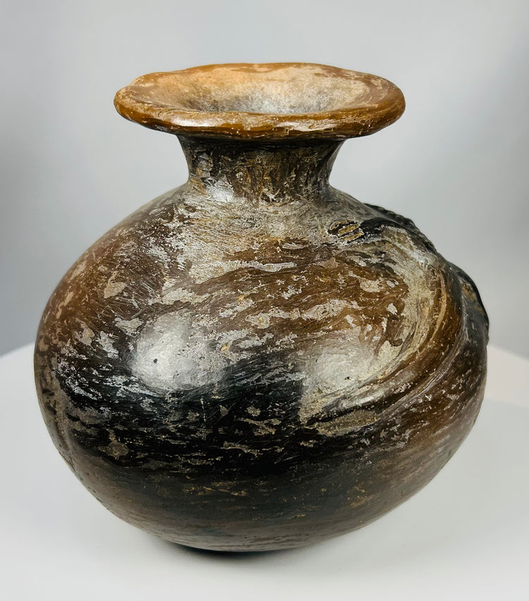 Nicoya terracotta vessel with incised geometric band and patina