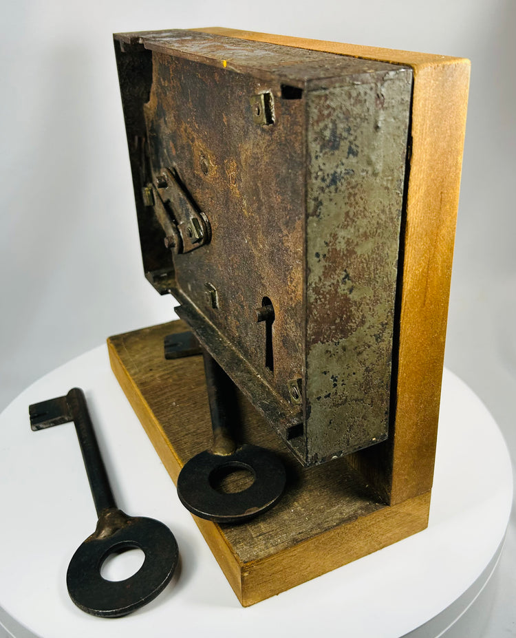 19th century door rim lock with original skeleton key and iron body