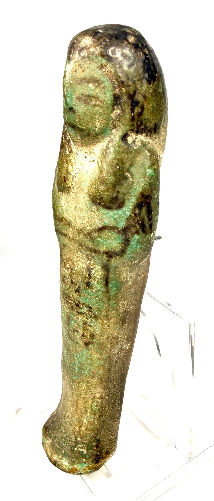 Ancient Egyptian ushabti with crossed arms, a rounded tripartite wig, and black-painted decorative details.