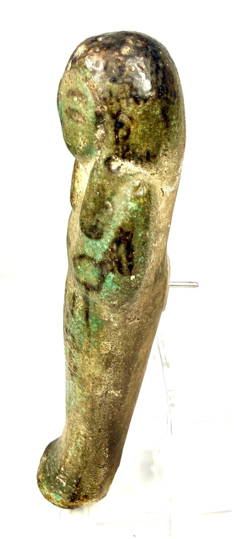 Blue-green glazed Egyptian funerary attendant with an elongated body and traditional mummiform proportions.