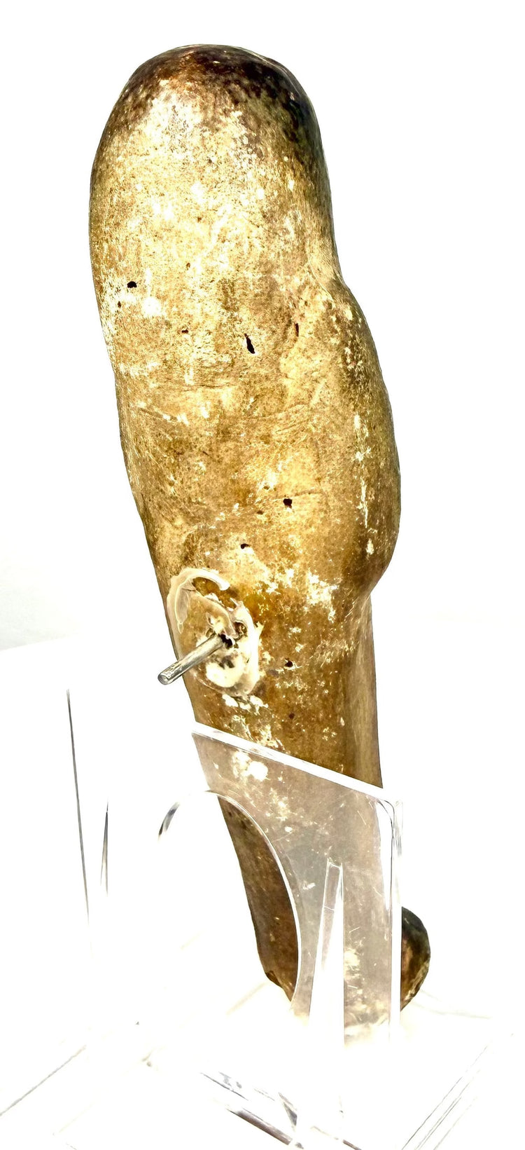 Third Intermediate Period Egyptian ushabti with surviving black-painted decoration across the arms and upper torso.