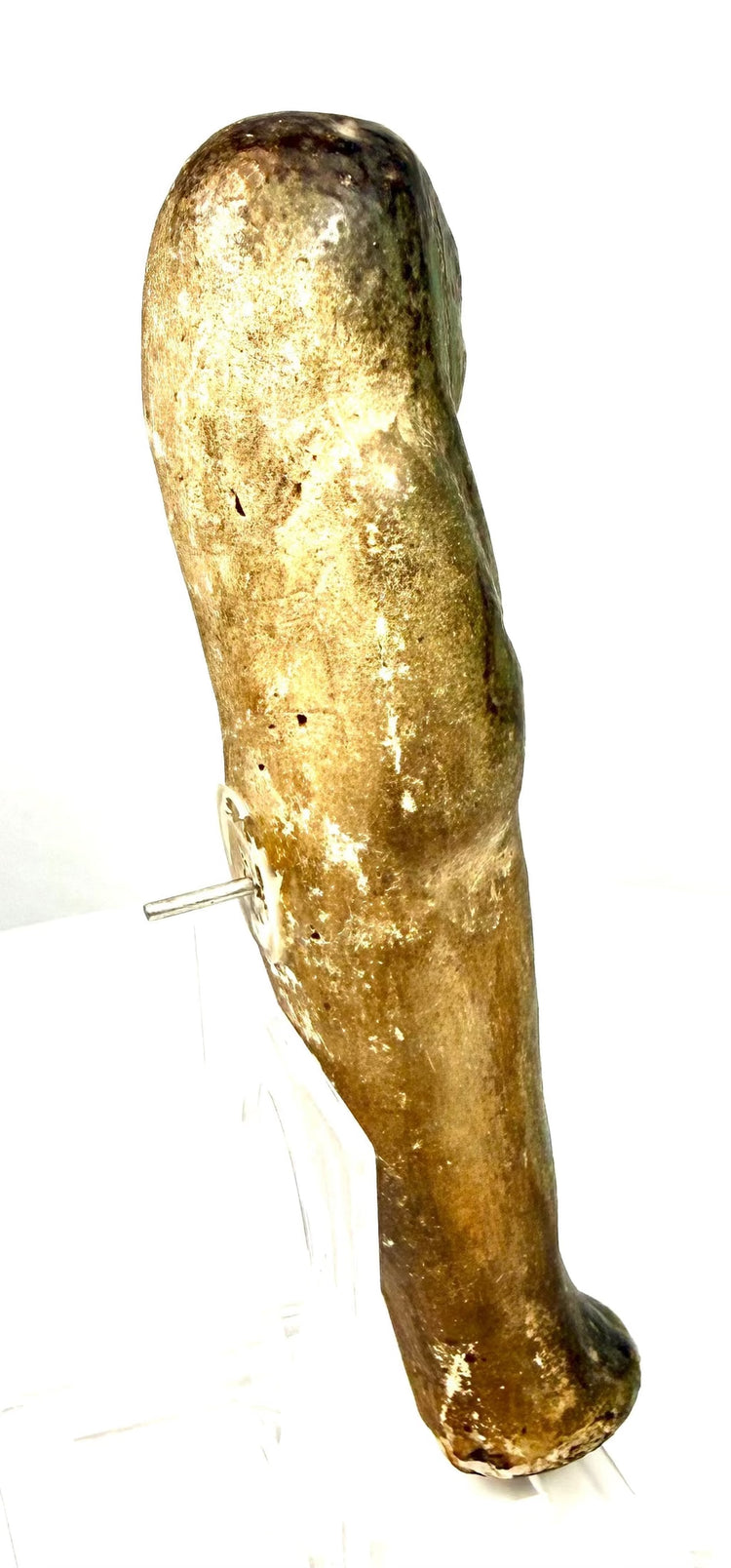 Ancient Egyptian turquoise faience funerary figurine with beige surface deposits and areas of naturally aged glaze.