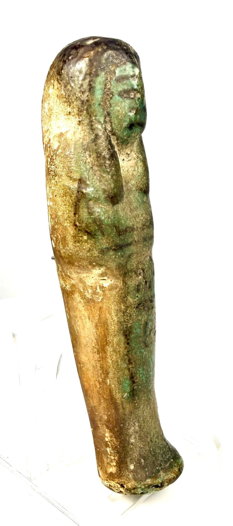 Ancient Egyptian shabti featuring a vertical column of worn hieroglyphic signs associated with funerary traditions.
