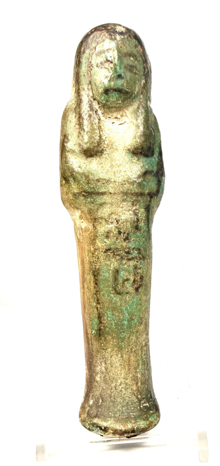 Egyptian faience shabti with a slender elongated body, rounded wig, and slightly projecting foot.
