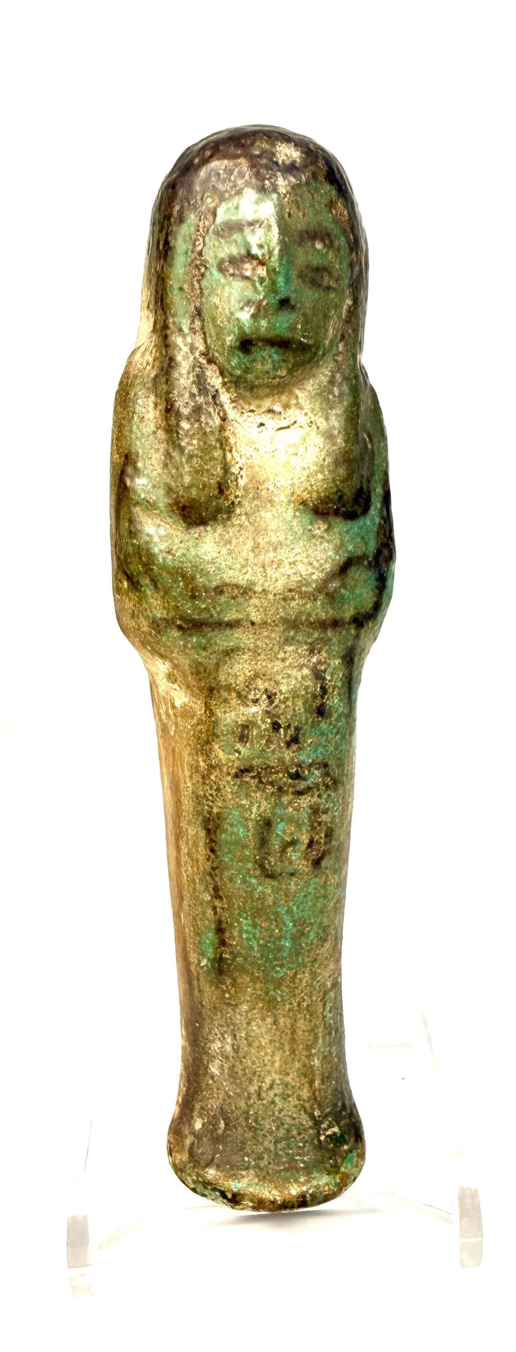 Third Intermediate Period shabti with surviving turquoise glaze contrasting against worn beige and brown surfaces.