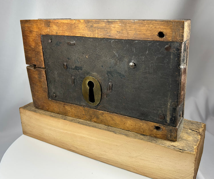 19th century rim lock with aged patina and iron reinforcements
