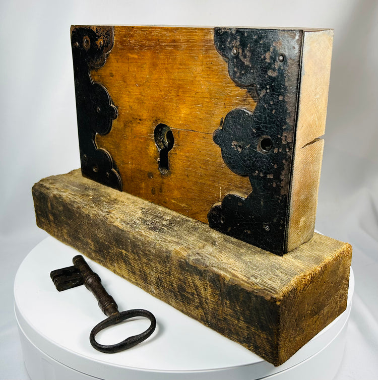 Early architectural door lock with skeleton key and wood case