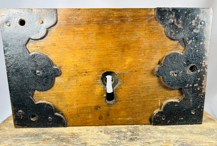 Antique rim lock with visible wear and traditional construction