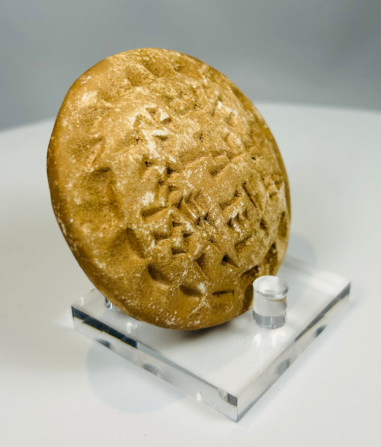 Ancient Indus Valley style stamp seal with worn symbolic carving