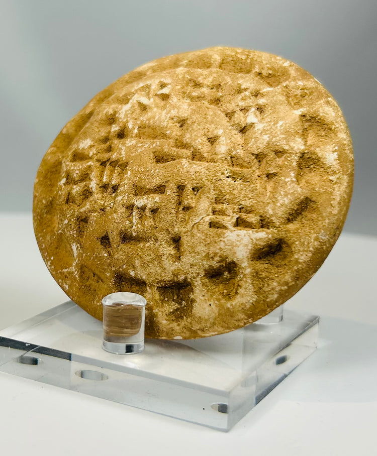 Archaeological stone seal with geometric decoration and patina