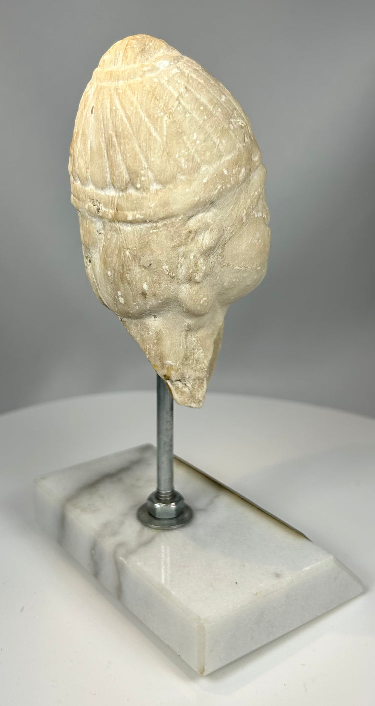 Bronze Age warrior head fragment with mineral patina and erosion