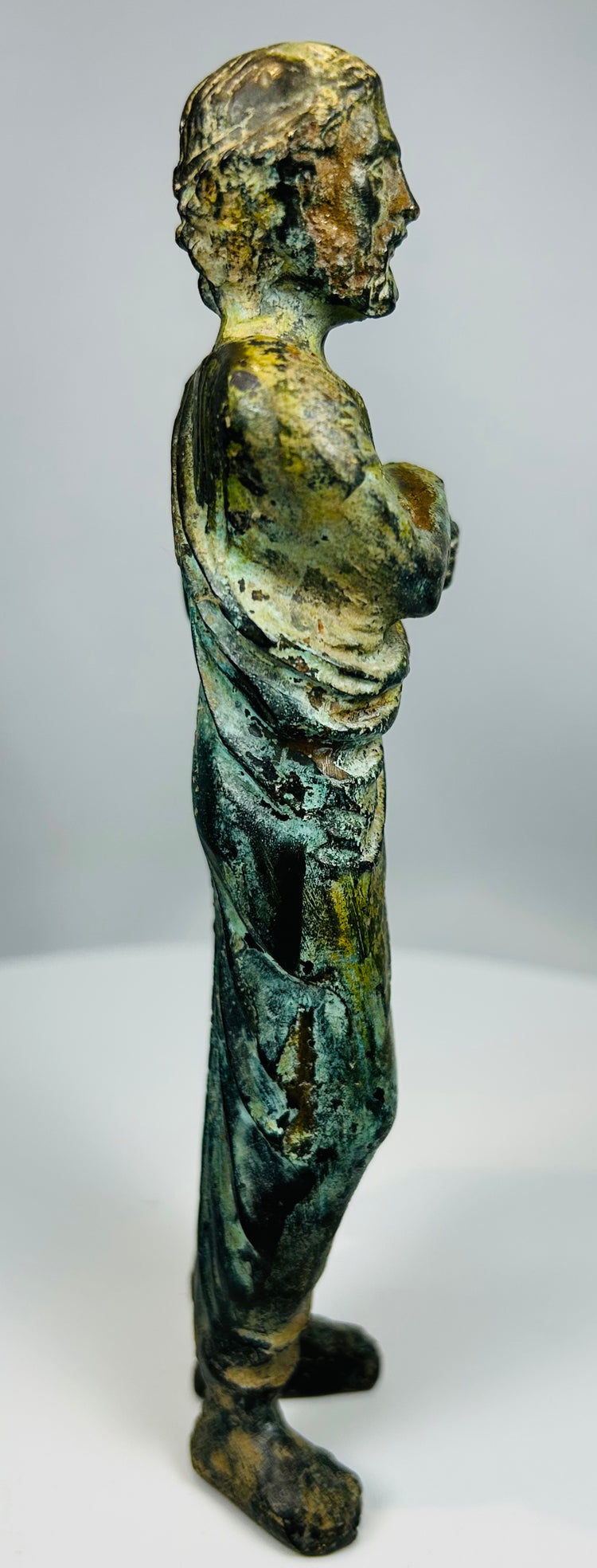 Bronze classical figure statue with detailed carving and aged surface finish