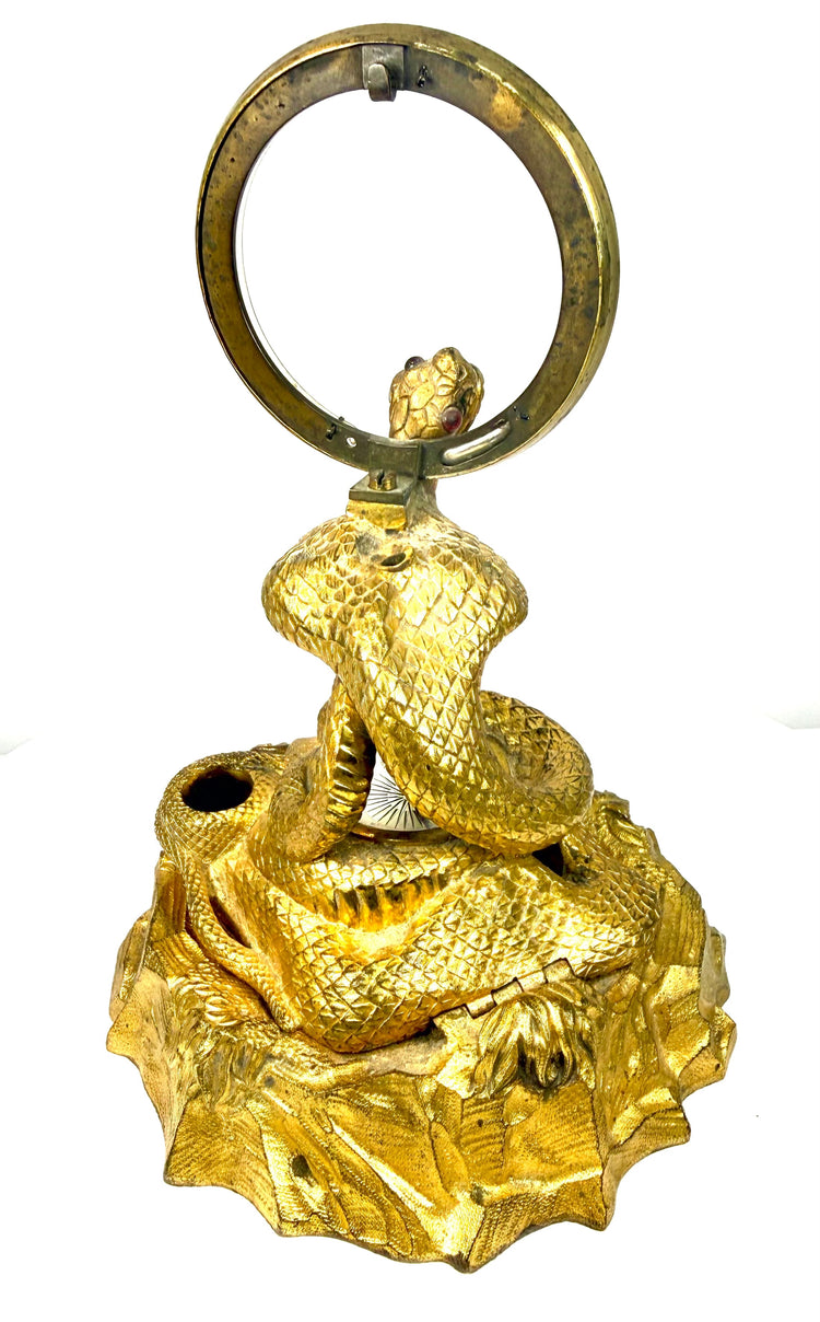 Benjamin Waterhouse Hawkins bronze cobra desk accessory featuring an upright serpent surrounded by decorative rockwork and foliage.