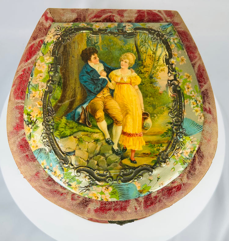 Antique celluloid collar box with floral design, brass hardware and linen collars inside